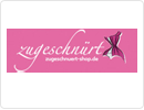 zugeschnürt